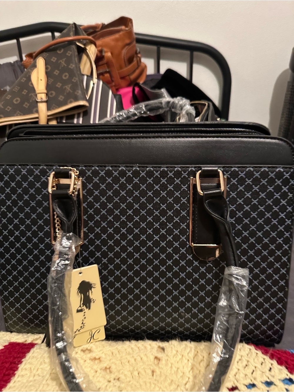 Black Patterned Satchel with Gold Accents by